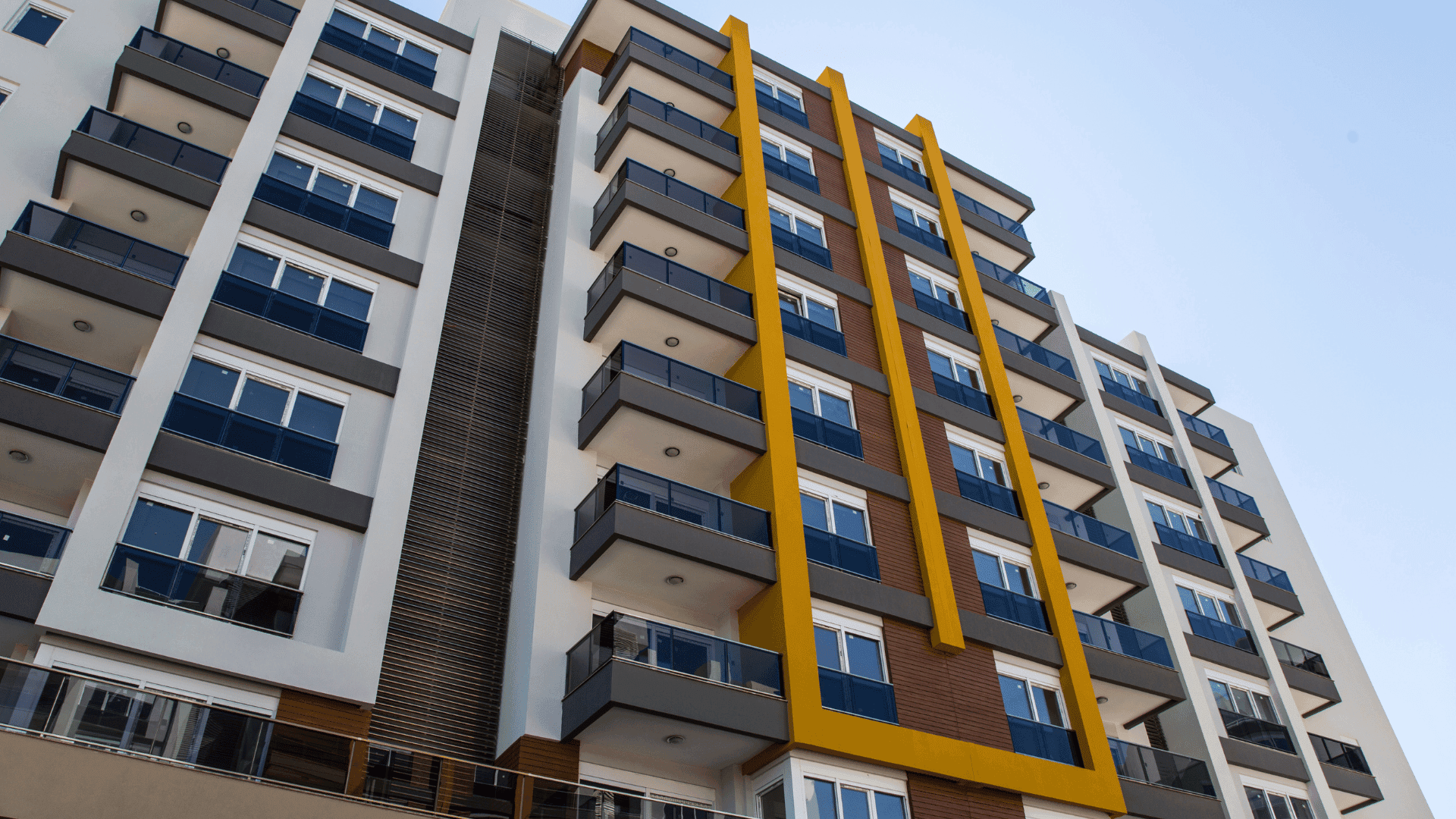 Modern apartment for rent in HSR Layout featuring a multi-storey residential building with balconies and contemporary design.