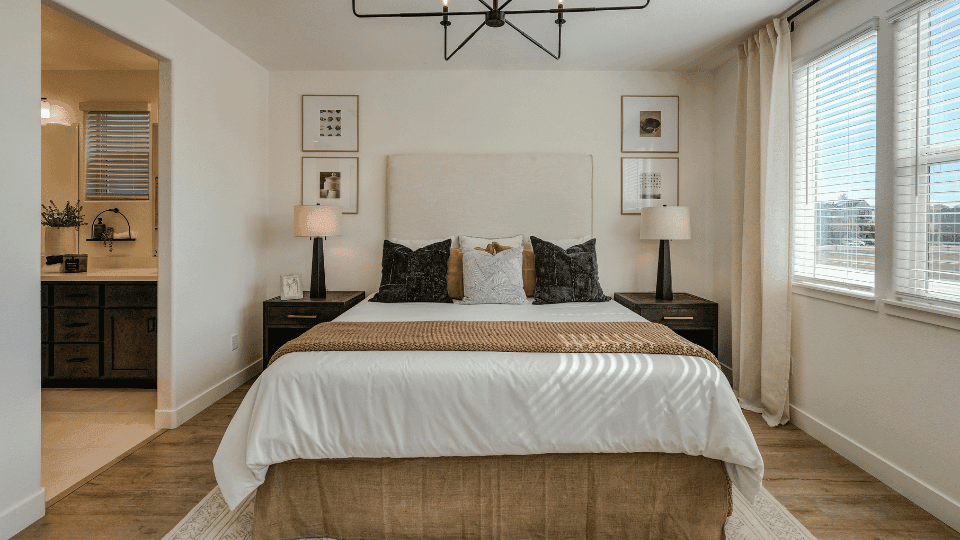 Modern open-plan studio featuring a light-wood kitchenette and dining area in premium flats for rent in Hyderabad.